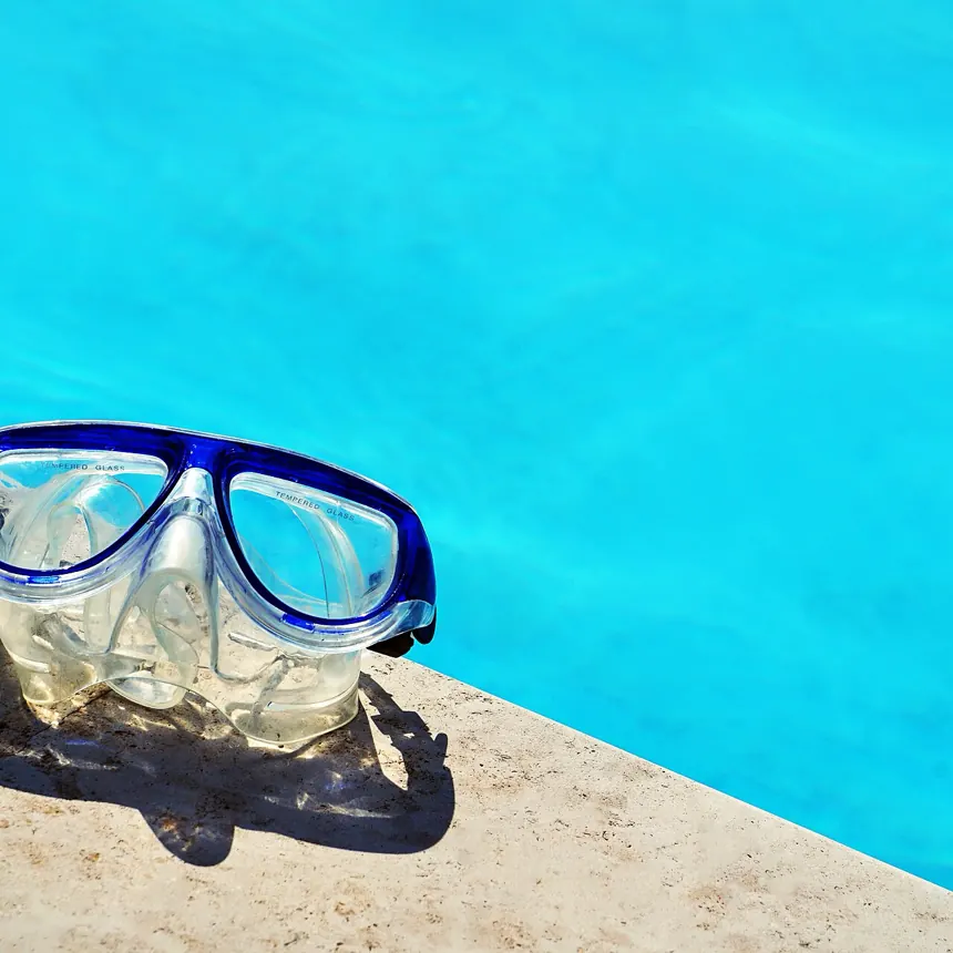 Goggles on the tiles at the end of a lap set